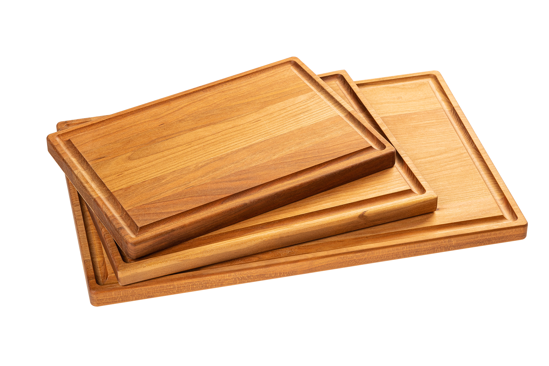 A set of three wooden cutting boards made from maple and cherry, stacked in descending size order.