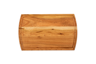 a reversible chop chop cherry wood cutting board with juice groove made in quebec made in canada
