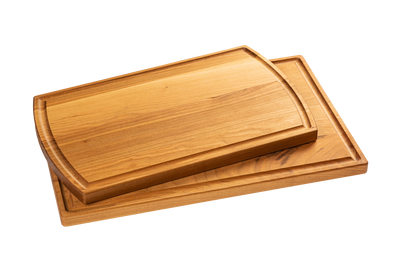 Two Chop Chop wooden cutting boards, rectangular, one larger with a juice groove and one smaller nested inside.