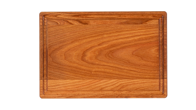 a reversible chop chop cherry wood cutting board with juice groove made in quebec made in canada