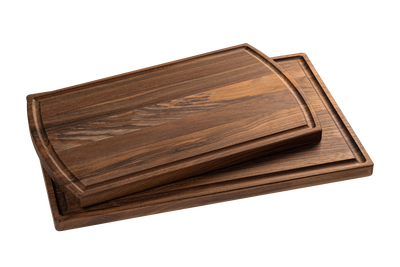 Two Chop Chop wooden walnut cutting boards, rectangular, one larger with a juice groove and one smaller nested inside.