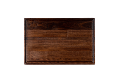 a reversible chop chop walnut wood cutting board with juice groove made in quebec made in canada