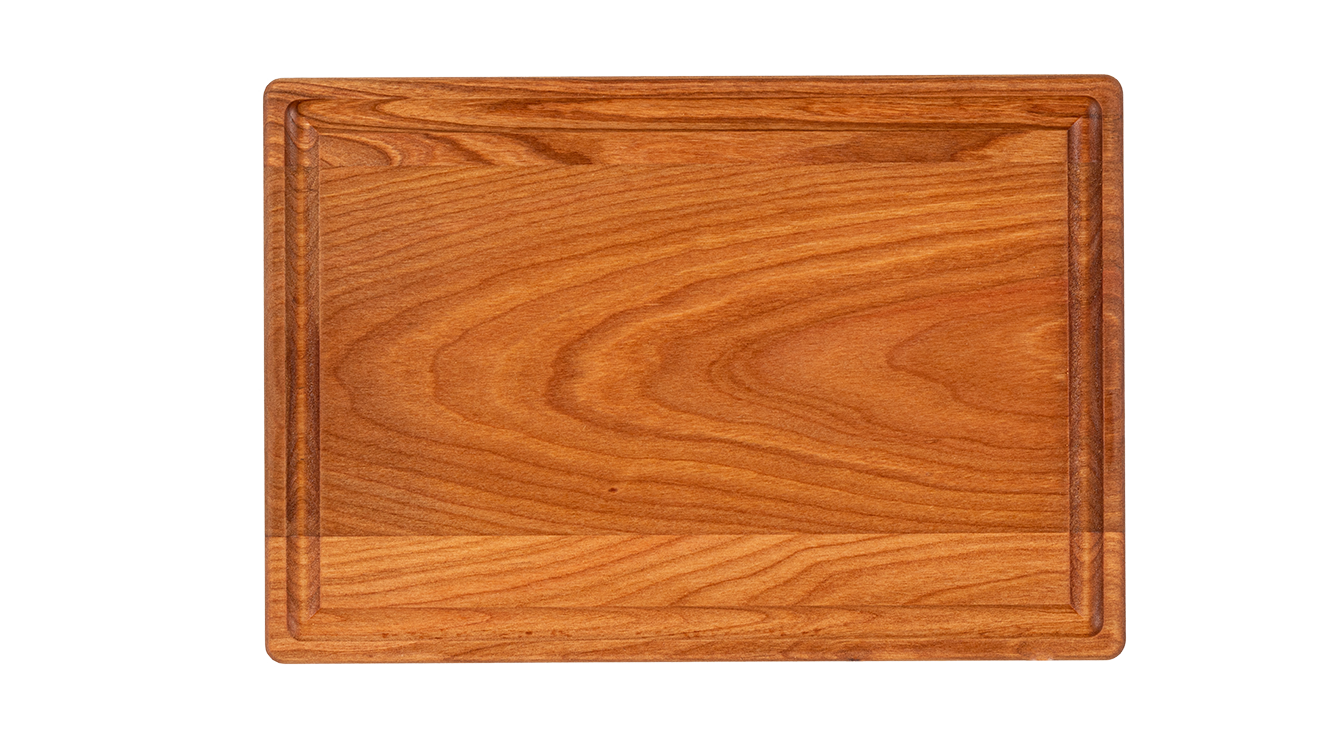 Chop Chop cherry wood cutting board ideal for chopping and serving.Made in Quebec