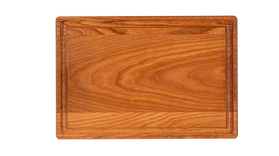 Chop Chop cherry wood cutting board ideal for chopping and serving.Made in Quebec