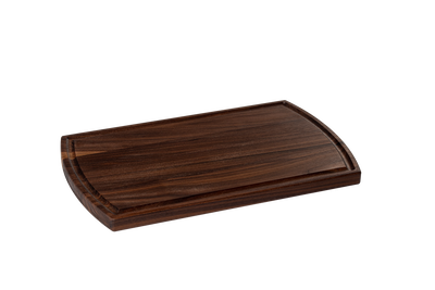 Chop Chop arched walnut hardwood cutting board with a juice groove, premium quality for everyday kitchen use. Made in Quebec.